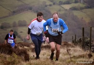 Keith Walmsley following Will Lowe (it's safer in a club vest Keith)
